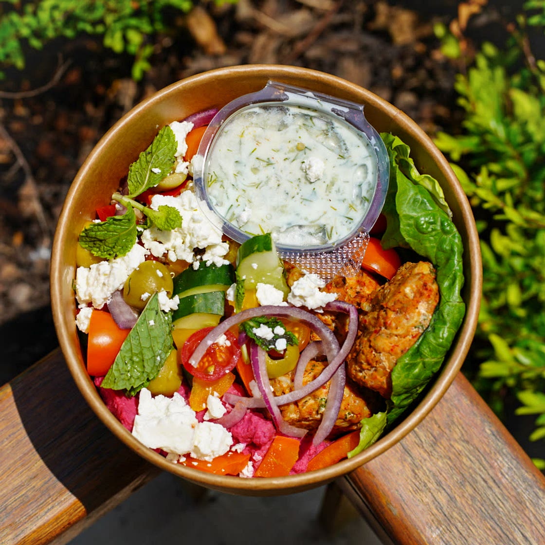 Mediterranean power bowl with chicken and tzatziki sauce