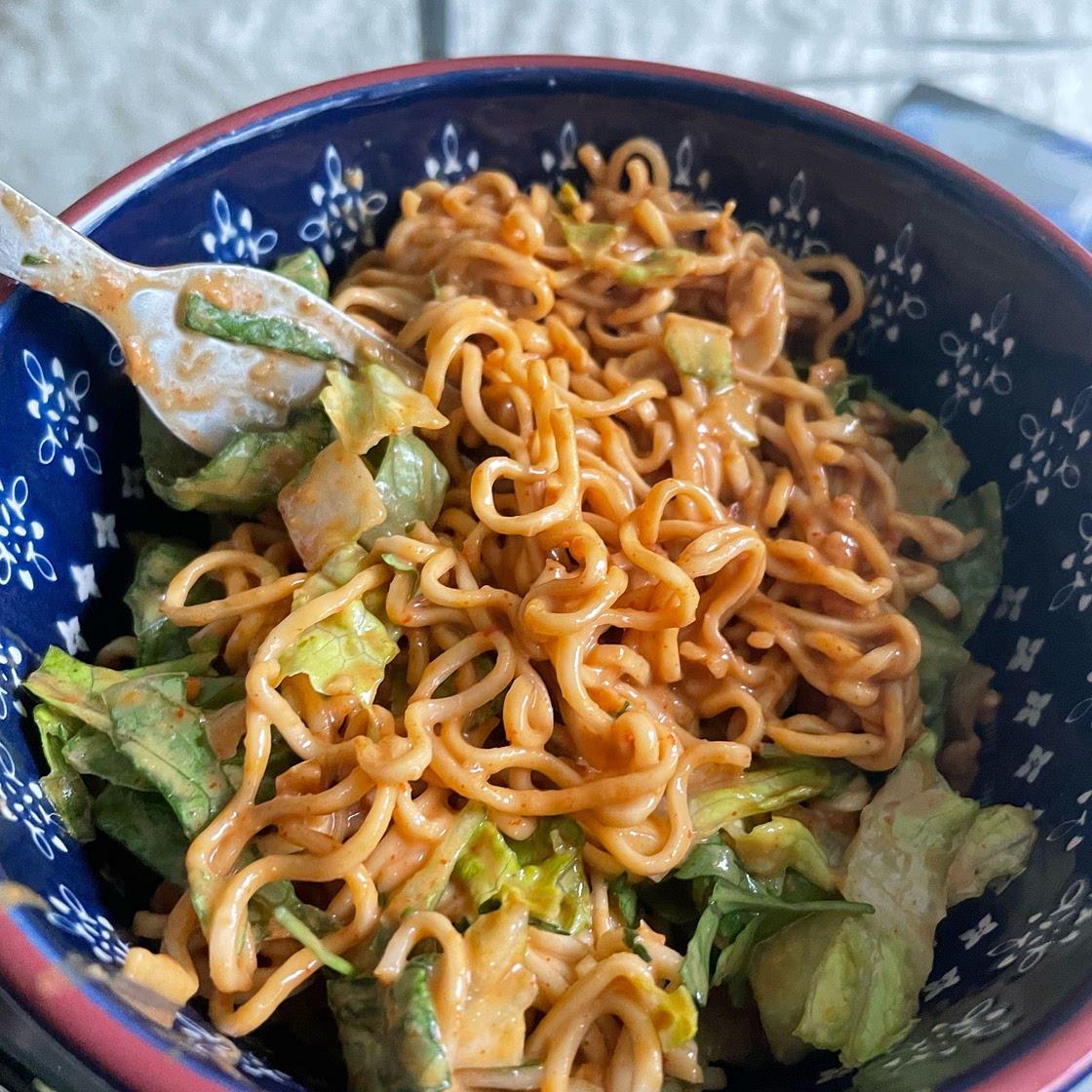 Fresh noodle salad with spicy peanut sauce