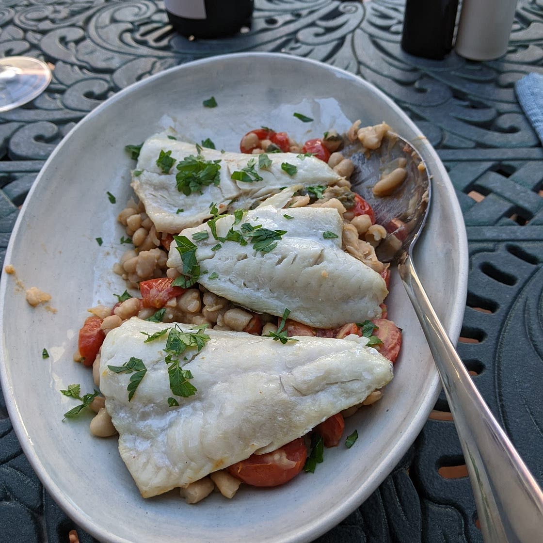 Seabass with tomato and butter bean ragout
