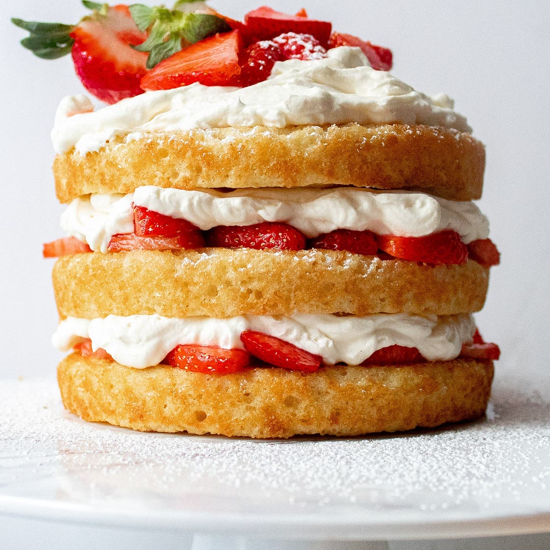 Vanilla Cake with Strawberries and Whipped Cream