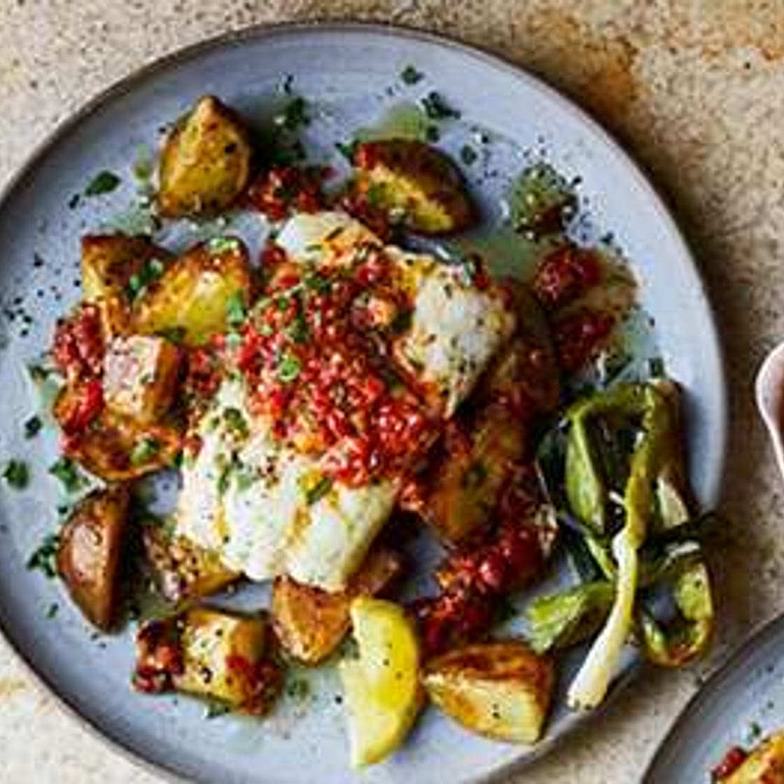 Hake with roast red pepper sauce & charred salad onions