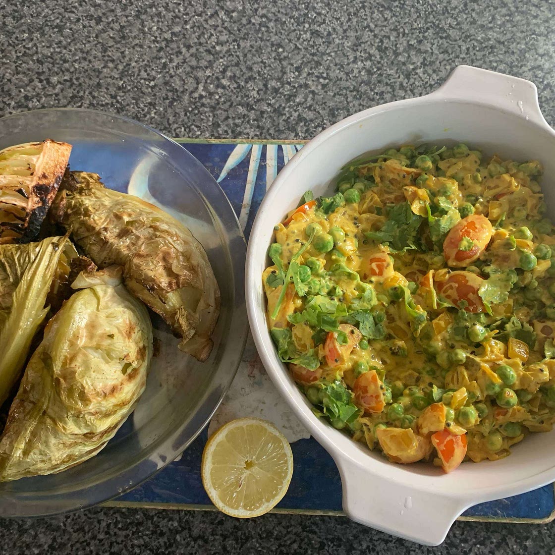 Charred Hispi Cabbage with Tomato, Pea and Coconut Curry