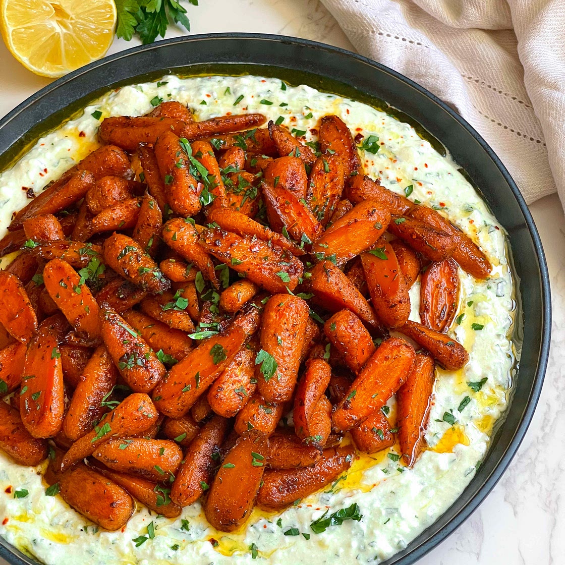 Honey Roasted Carrots Over A Bed Of Citrus Herb Feta Dip 