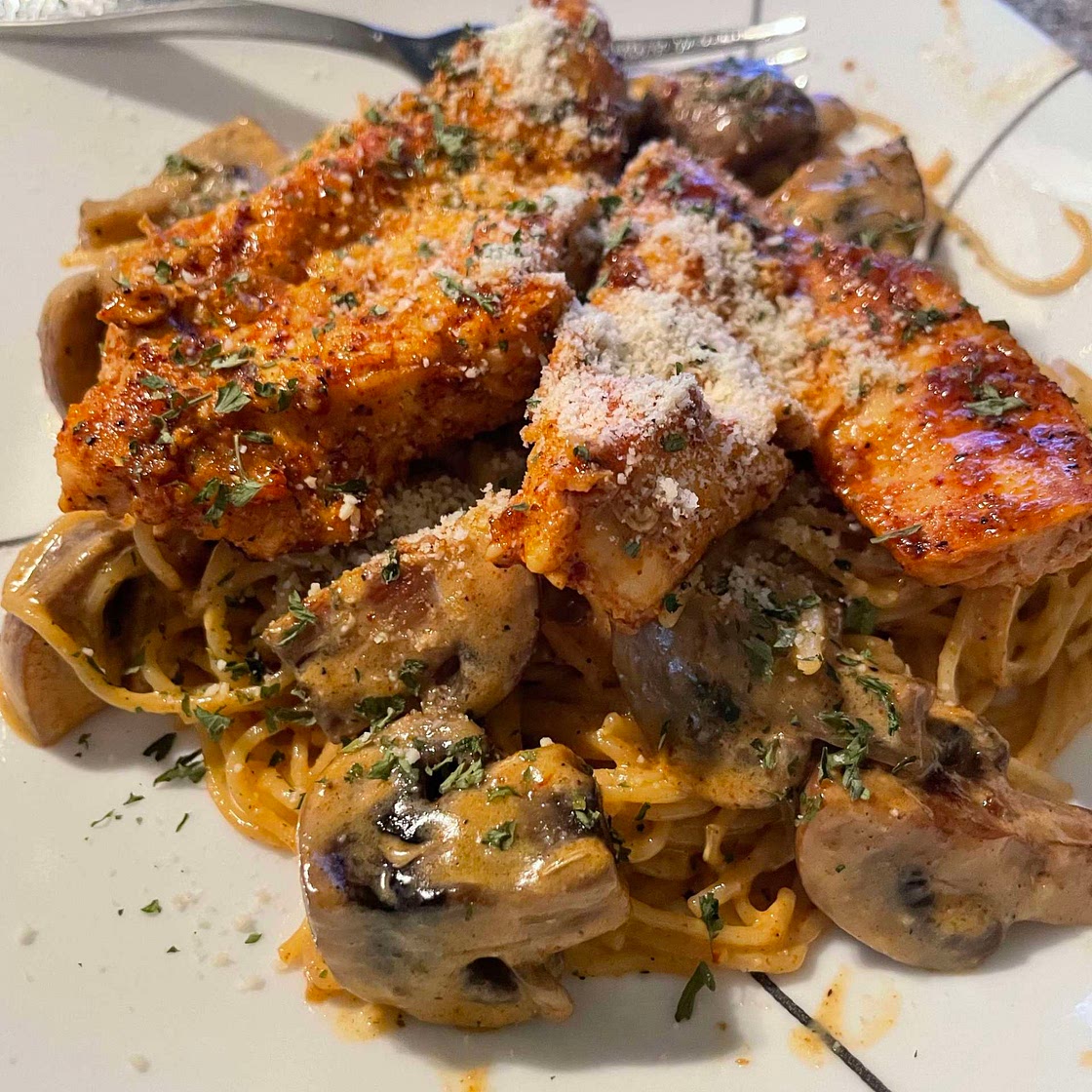 Chicken and mushrooms over pasta 