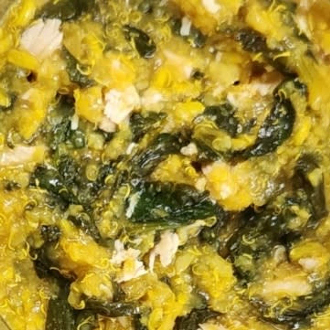 Chicken and quinoa soup with ginger and greens