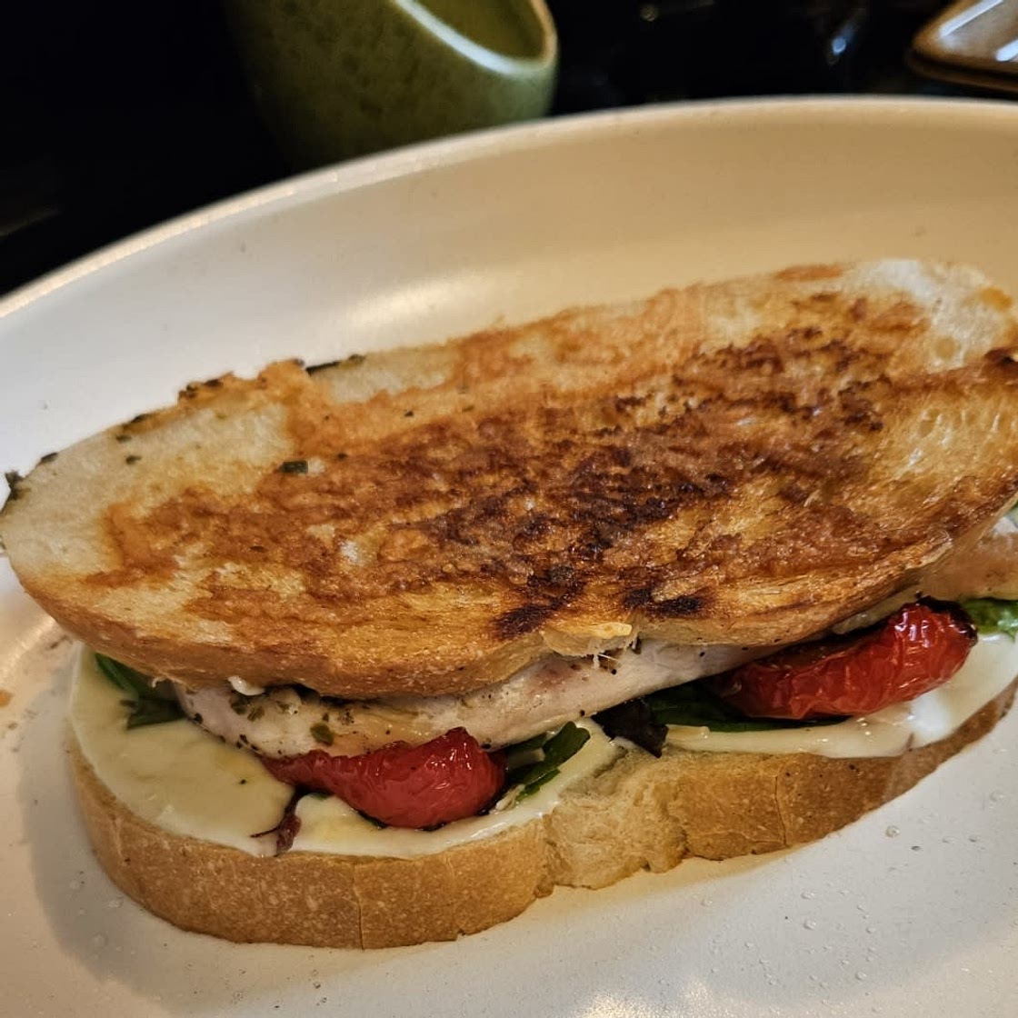 Pesto Chicken Melt on Crispy Parm-Grilled Sourdough