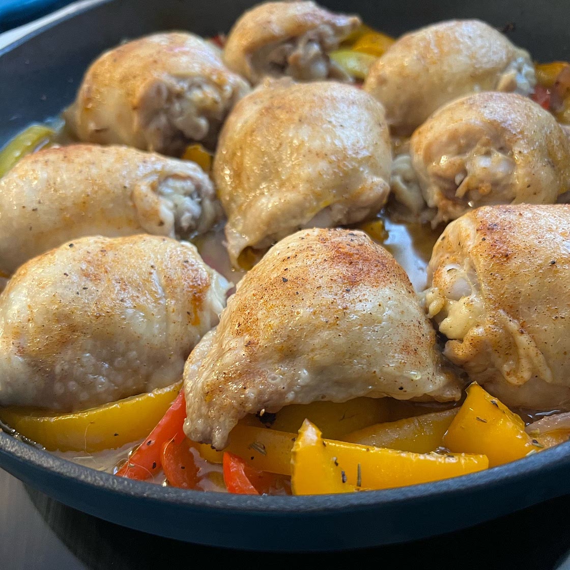 5-ingredient oven-roasted chicken thighs and red peppers