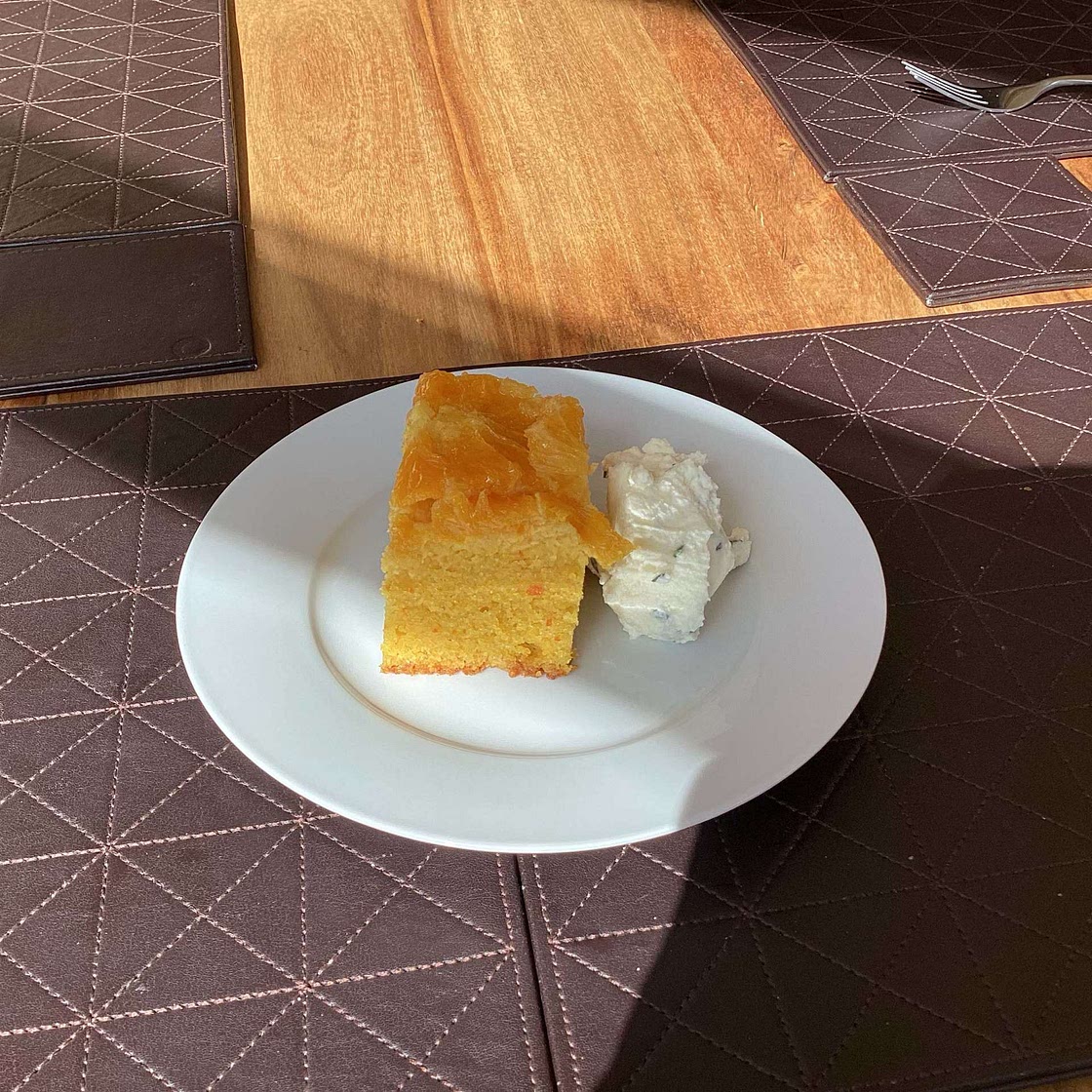 Orange, polenta and olive oil cake with mascarpone and thyme