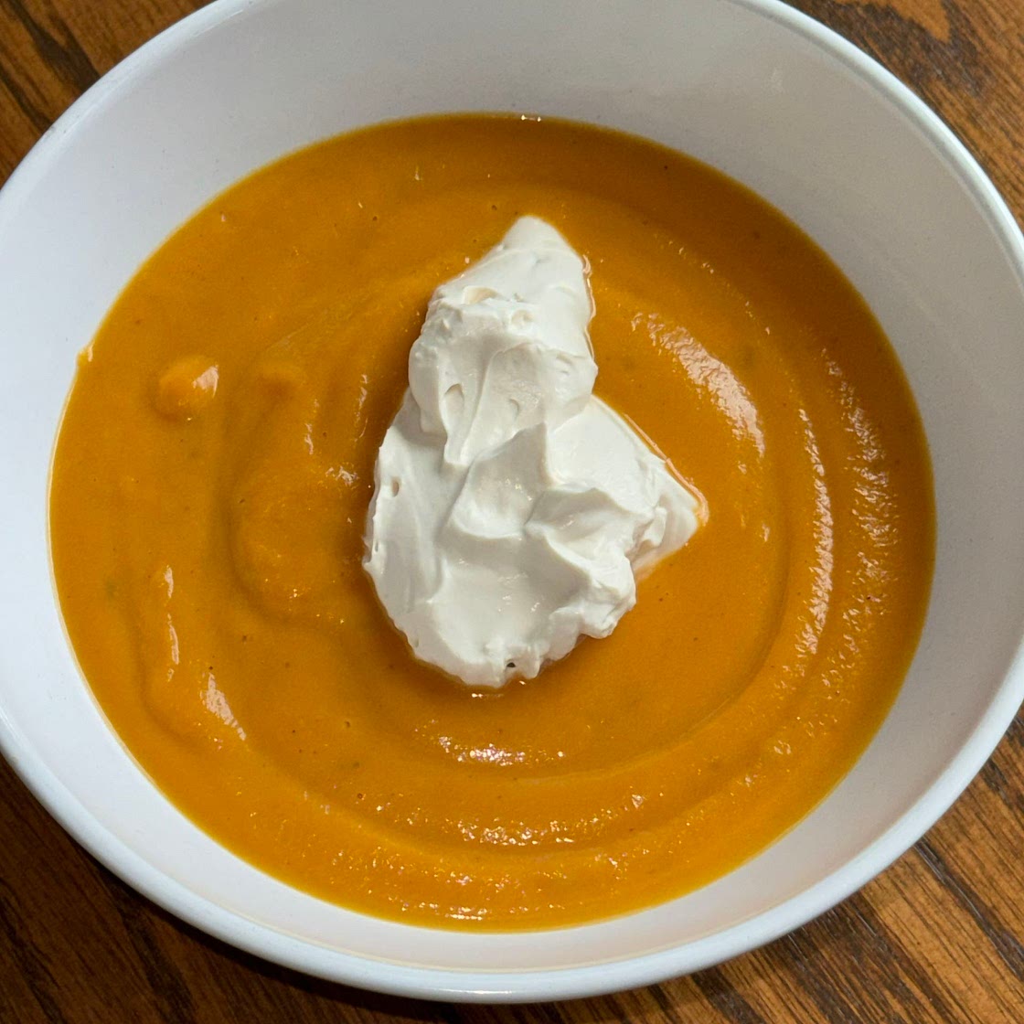 Sweet potato soup with rum cream