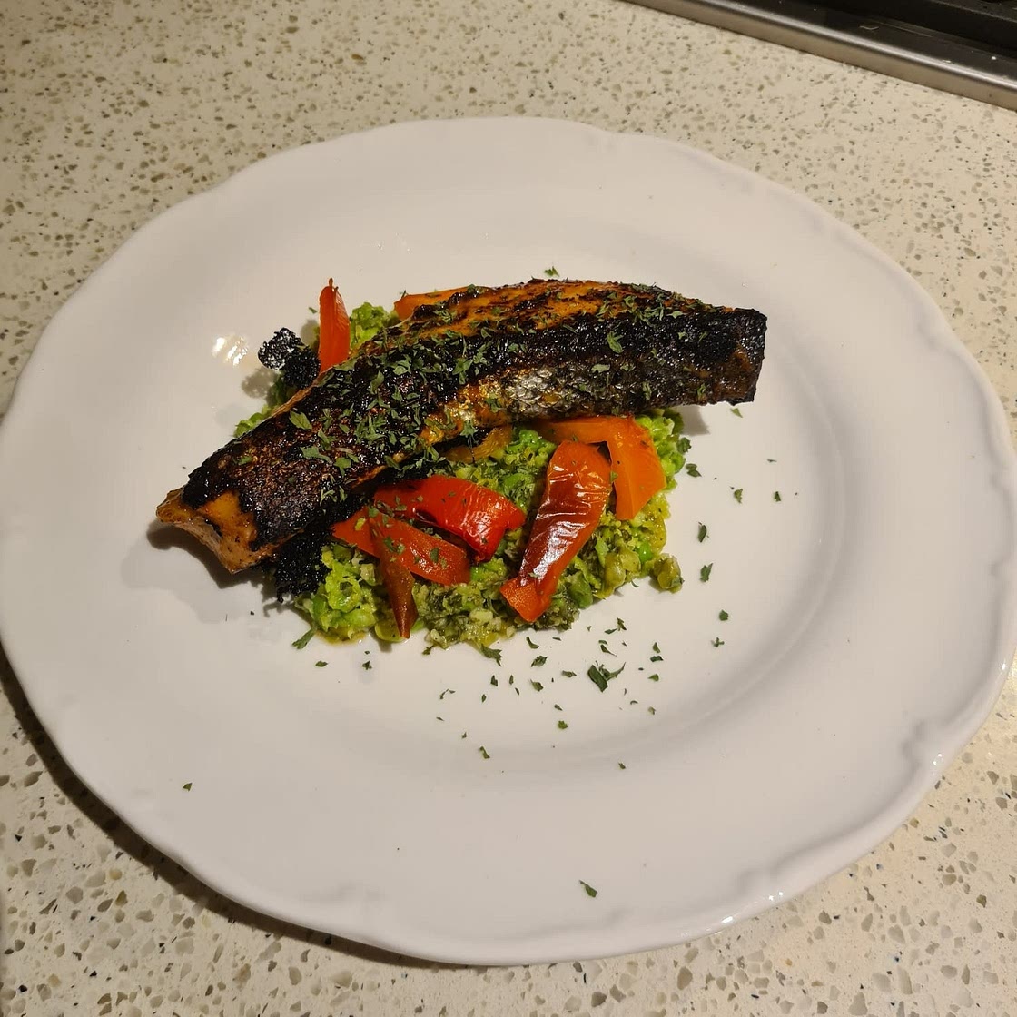 Firecracker Salmon with pea mash and roasted capsicum