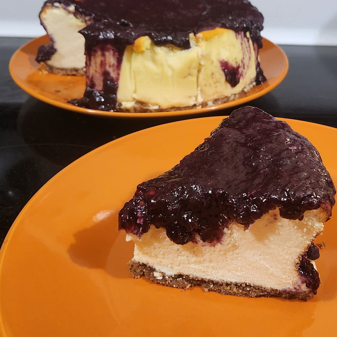 Cottage cheese Cheesecake topped with fruit preserves and nuts.