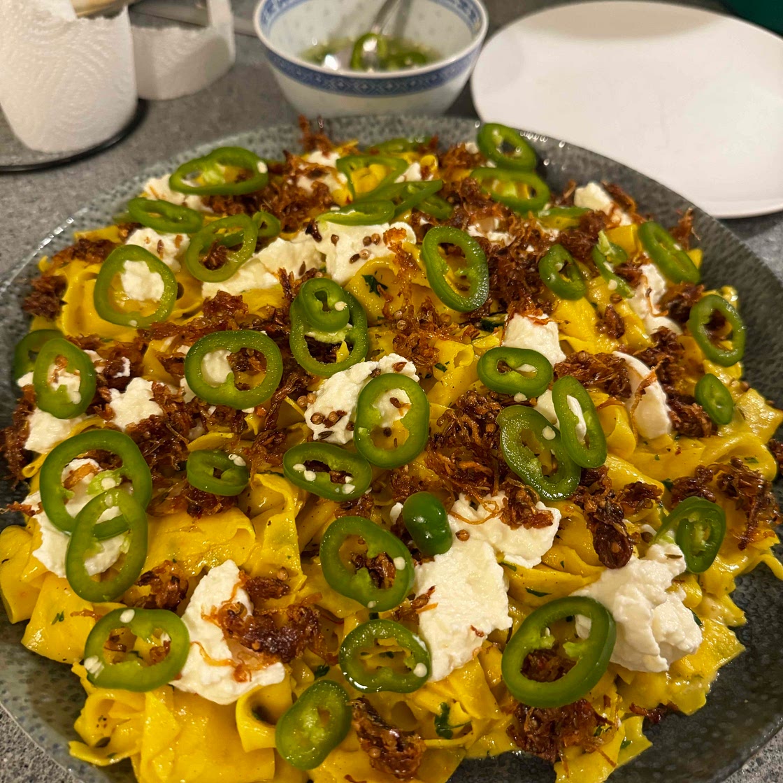 Saffron pasta with chipotle shallots and pickled chillies