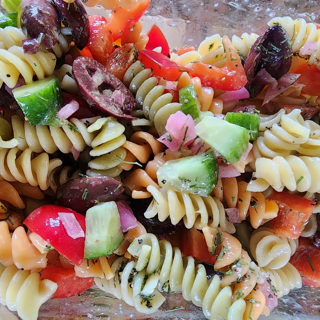 Greek pasta salad with spinach and feta