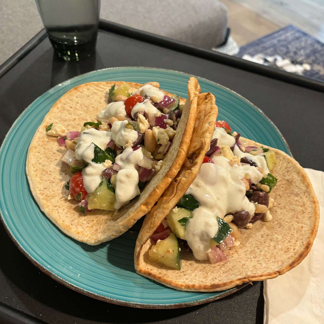 Greek salad wraps with white beans and garlic yogurt
