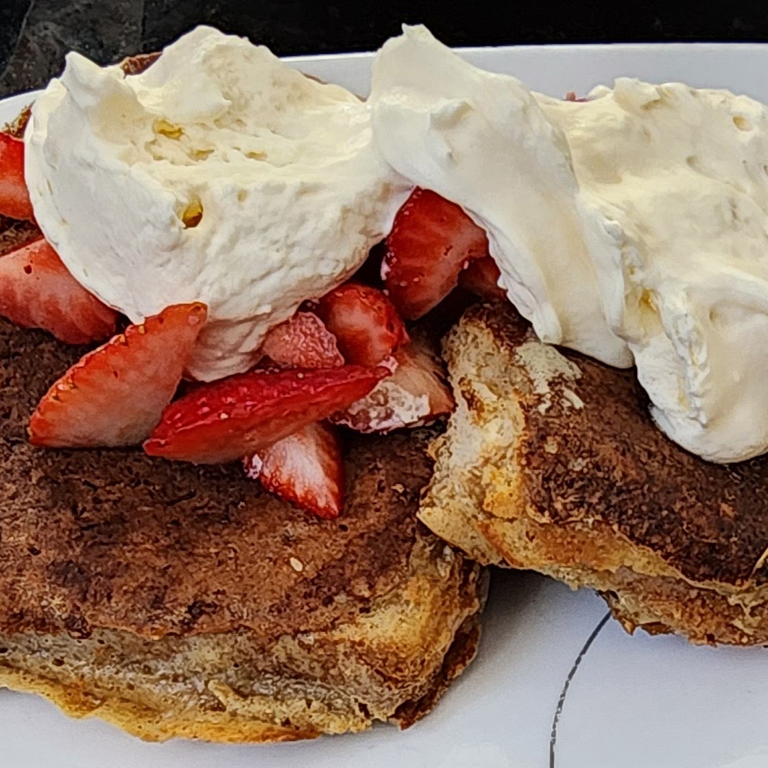 Country Style French Toast with Armaretto Whipped Cream and Strawberries