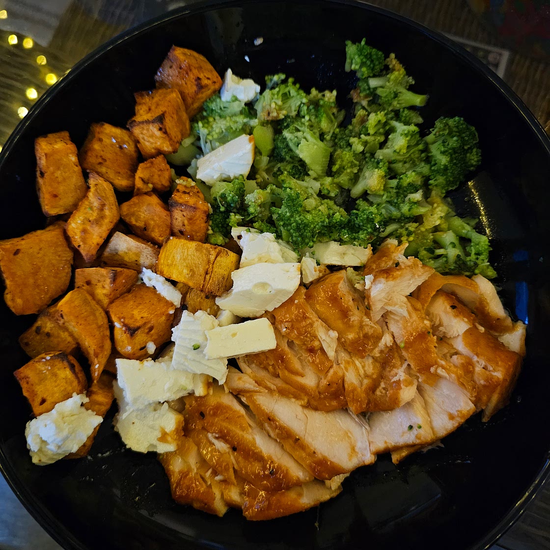 Asian salmon sweet potatoes broccoli and white cheese bowl