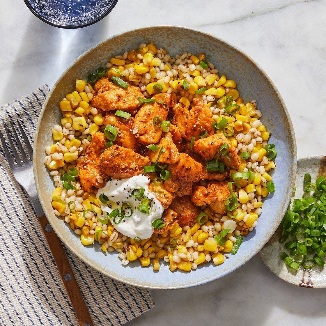 Cajun Chicken, Corn & Barley Bowl with Scallions & Sour Cream