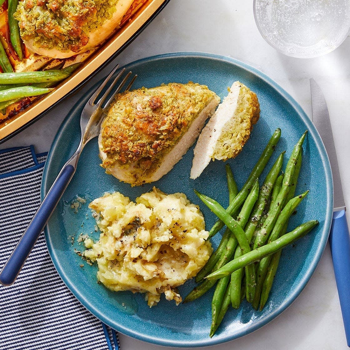 Baked Cheesy Pesto Chicken with Mashed Potatoes & Garlic-Herb Green Beans