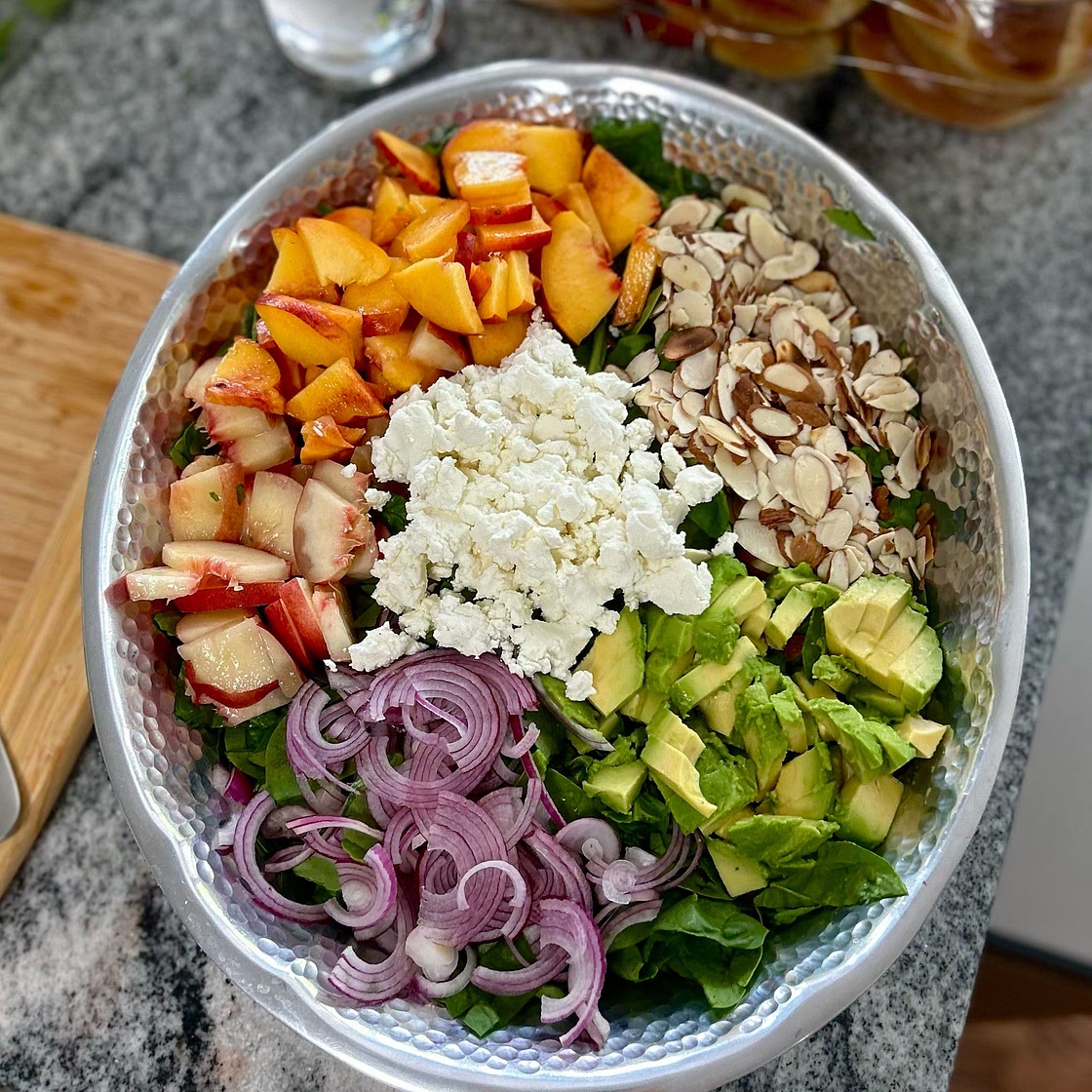 Summer Peach Spinach Salad with Avocado, Toasted Almonds + Goat Cheese