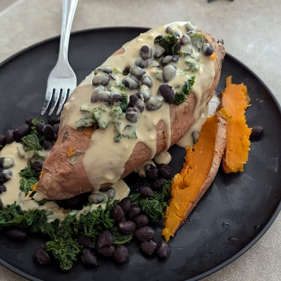 Stuffed Sweet Potato with Hummus Dressing