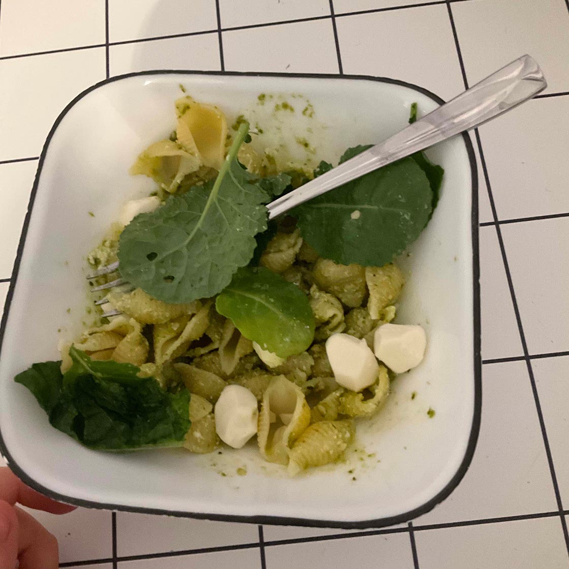 Healthy and nutritious kale and basil pesto pasta salad