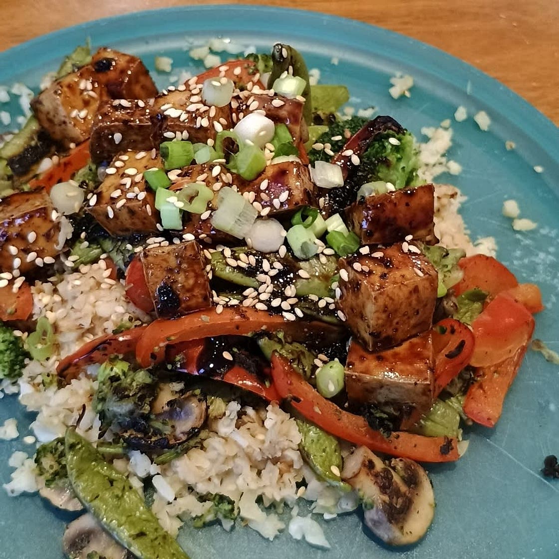 Broccoli and Snow Pea Stir Fry with Pineapple and Baked Tofu