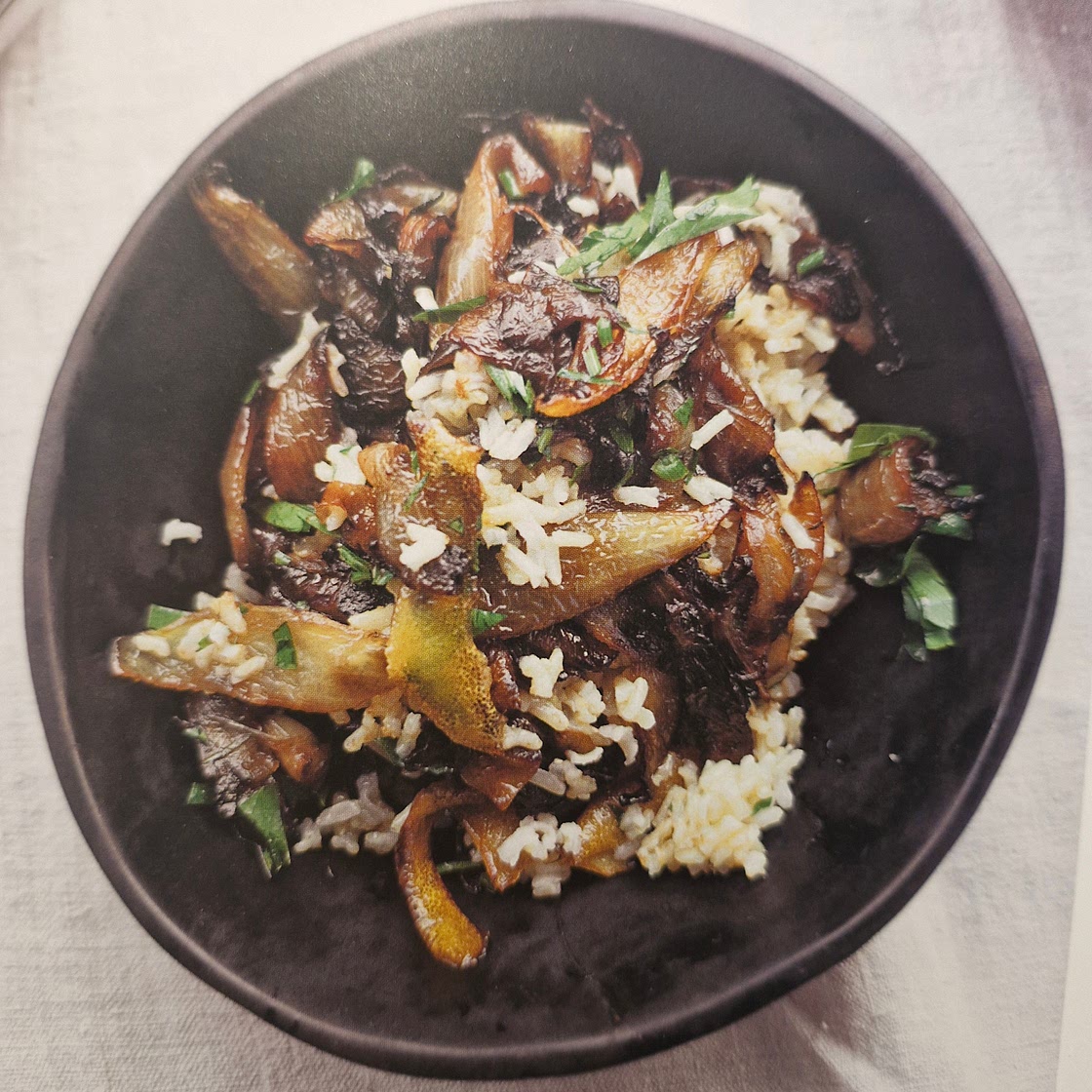Brown rice with caramelised onions and black garlic - page 168