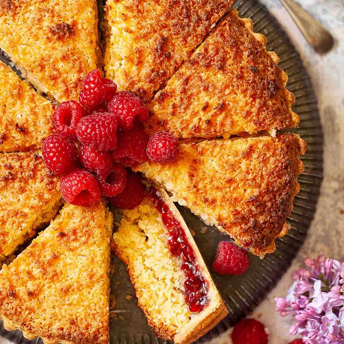 Coconut tart with raspberry jam