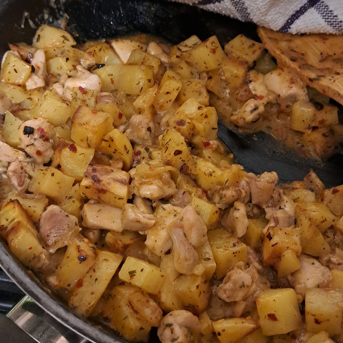 Cheasy, spicy chicken and potatoes