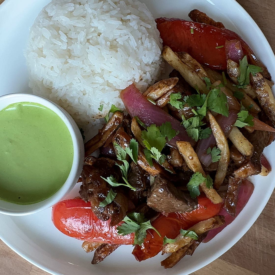 Lomo Saltado with fries 