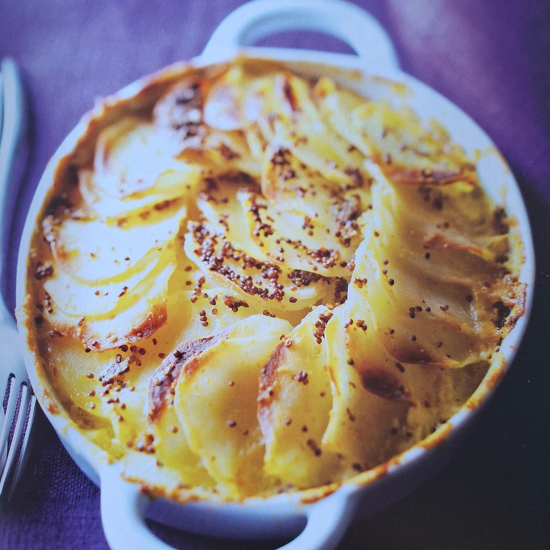 Aardappelgratin met mosterdzaadjes
