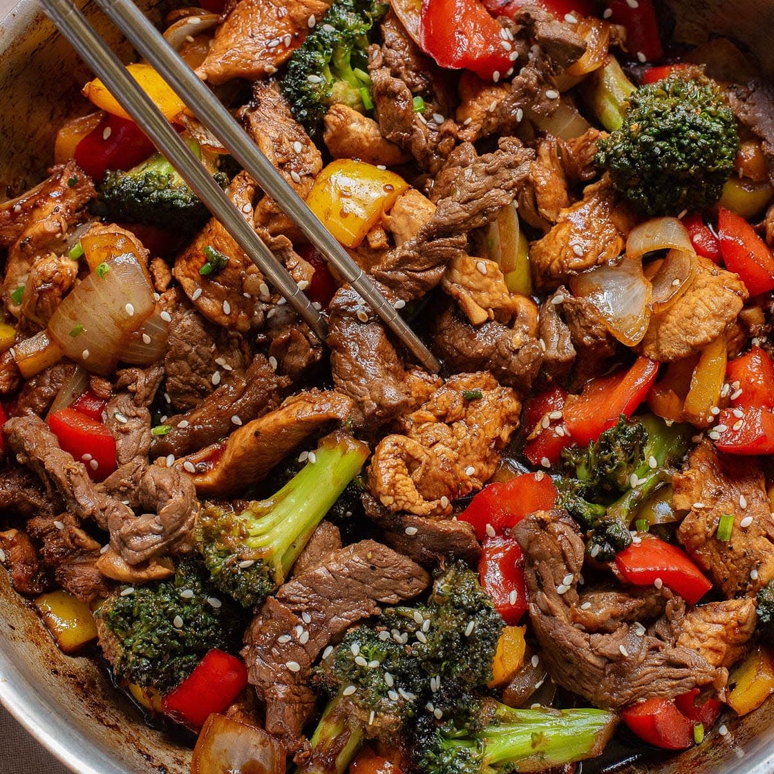 Stir-fry with general tso's chicken and steak strips