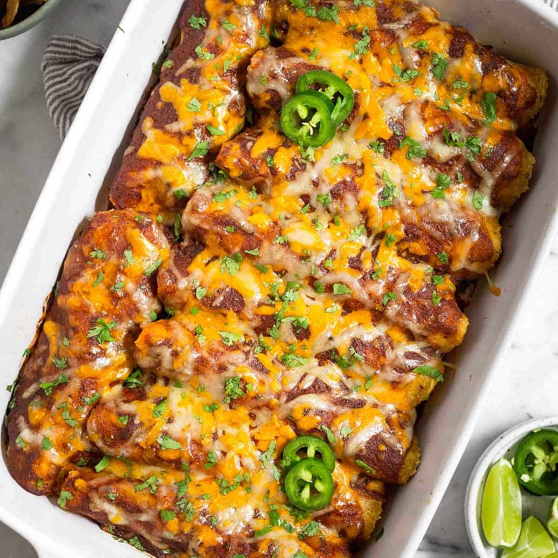 Enchiladas with Sriracha-Lime Sauce and Guacamole(as well as jalapeno salsa)