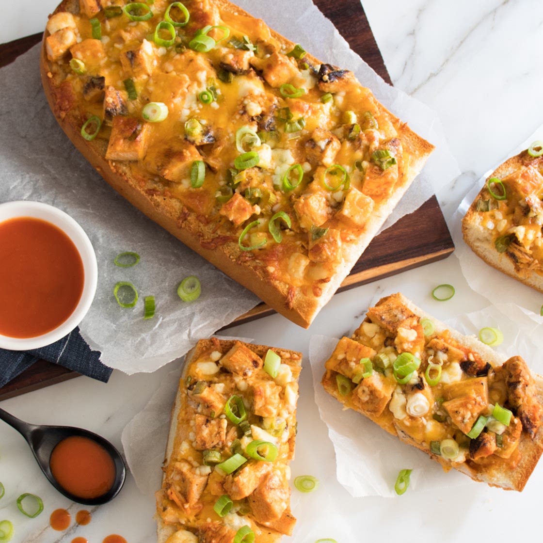 Baked Buffalo Chicken French Bread Pizzas