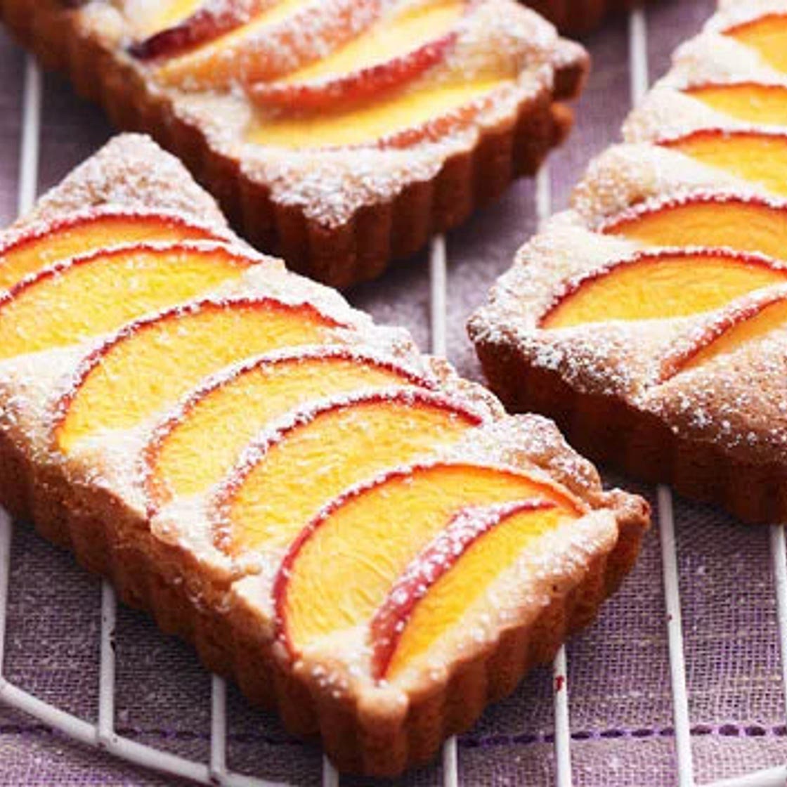Peach and almond tarts