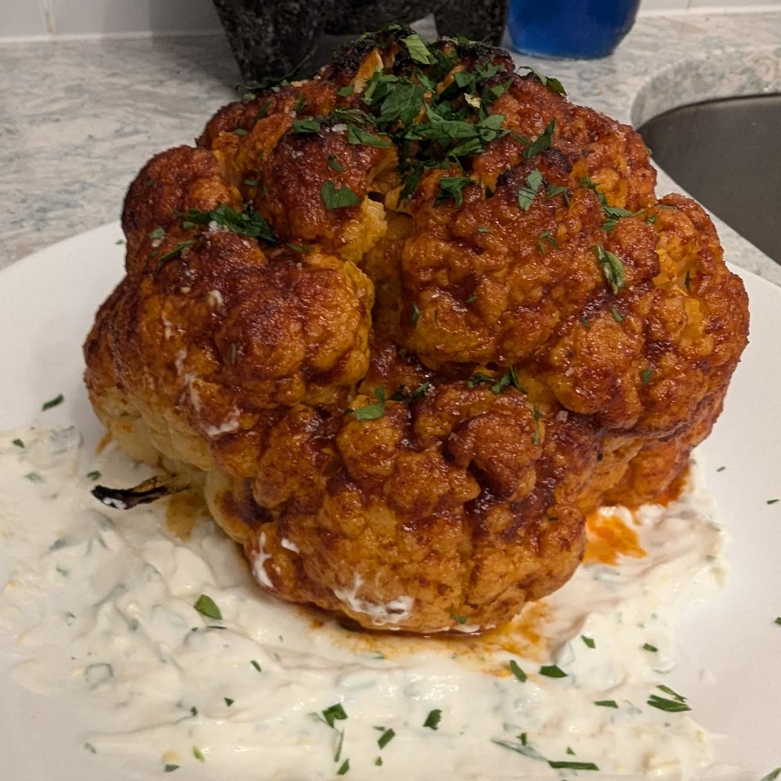 Whole-Roasted Harissa Cauliflower with Garlic Yogurt