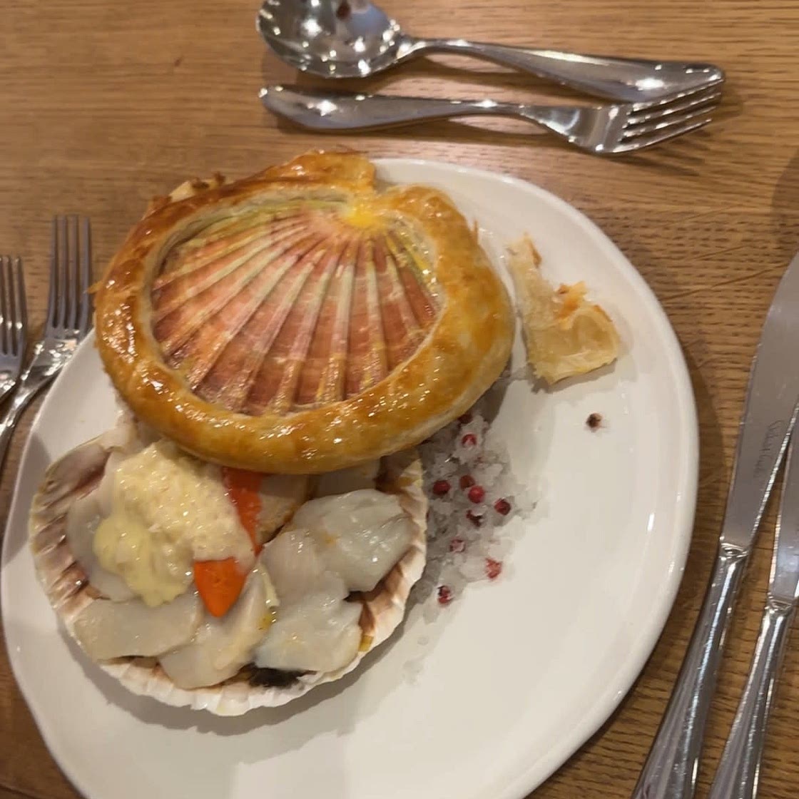 Scallop baked in shell with truffle