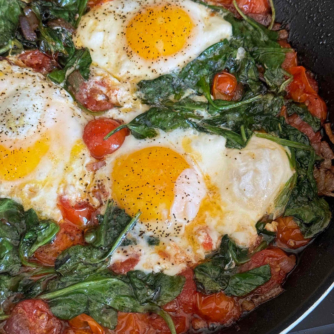 Shakshuka With Tomatoes And Spinach 