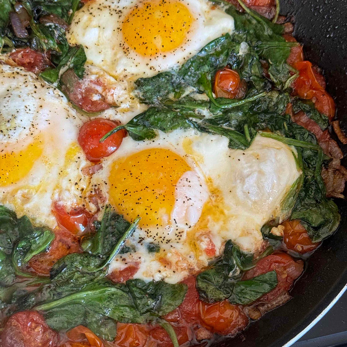 Shakshuka With Tomatoes And Spinach 