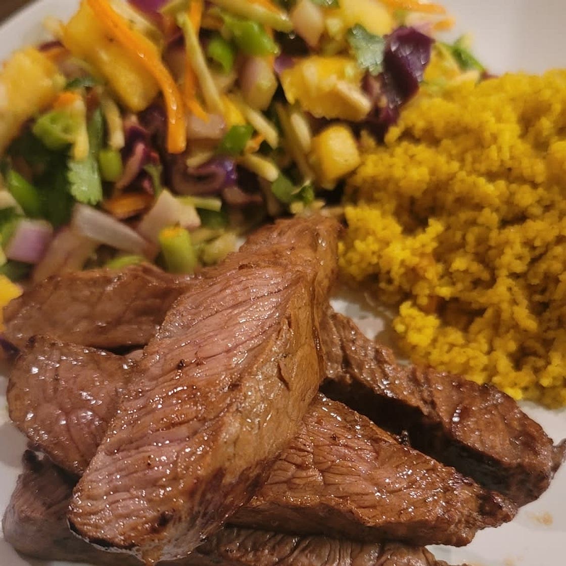 Grilled Sirloin Steak with Pineapple, Carrot, Cilantro & Broccoli Slaw