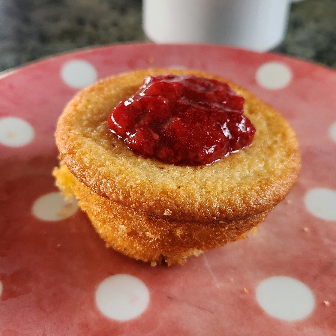Lemon almond cupcakes with strawberry topping