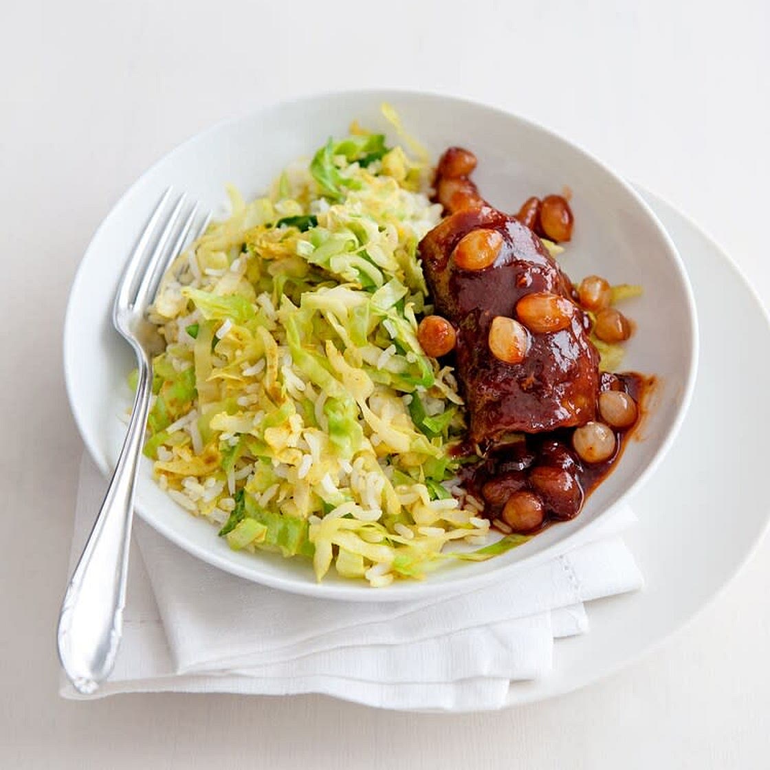 Slavinken in zoetzure saus met spitskool