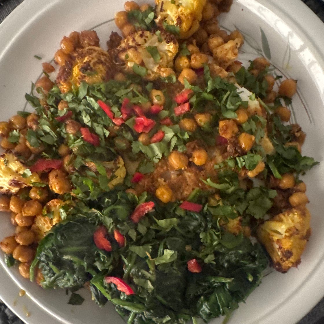 Curried butter-baked cod with cauliflower & chickpeas