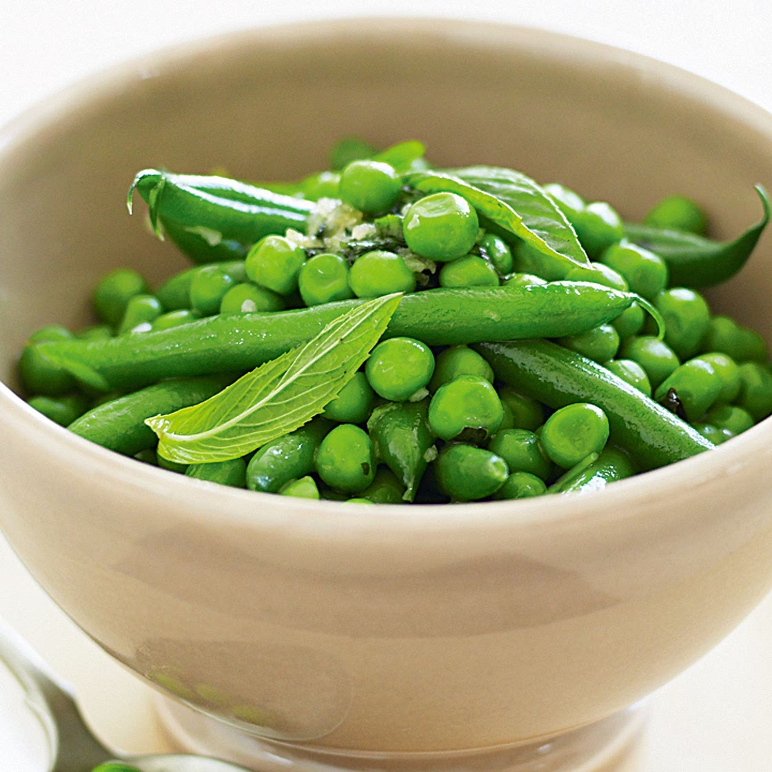 Peas and beans with minted garlic butter