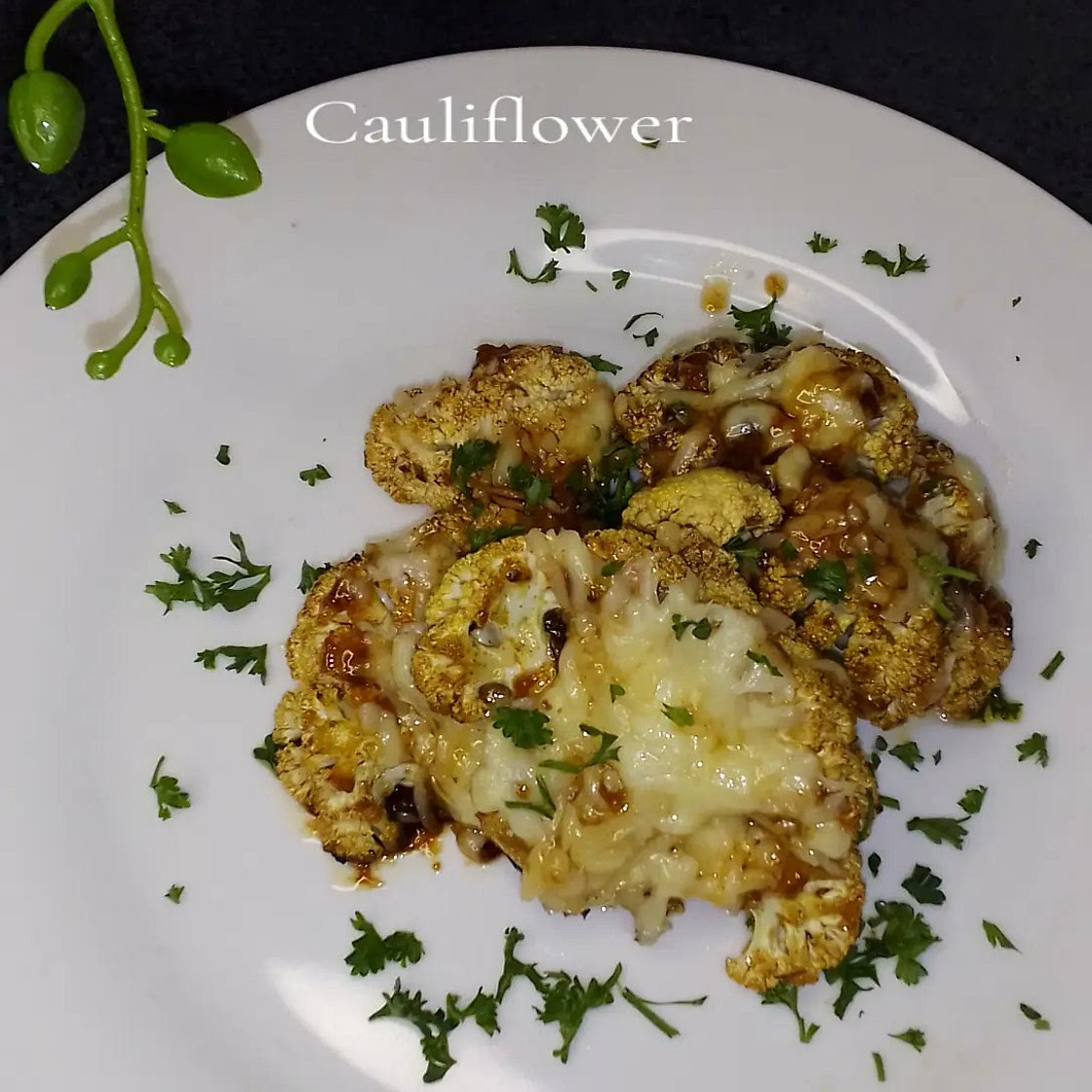 Grilled cauliflower with cheese topping