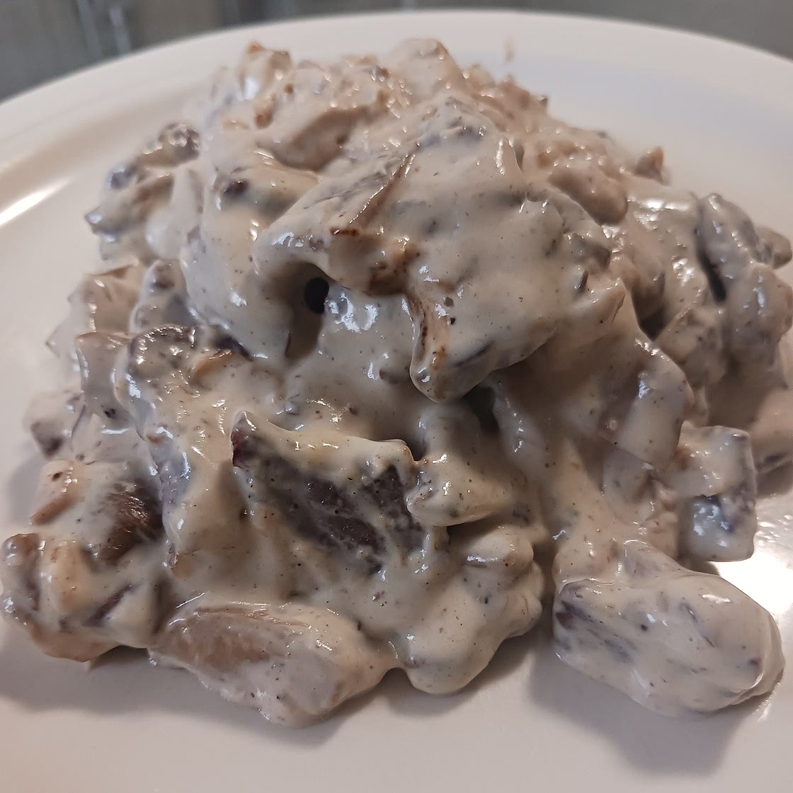 Ternera con setas y queso azul