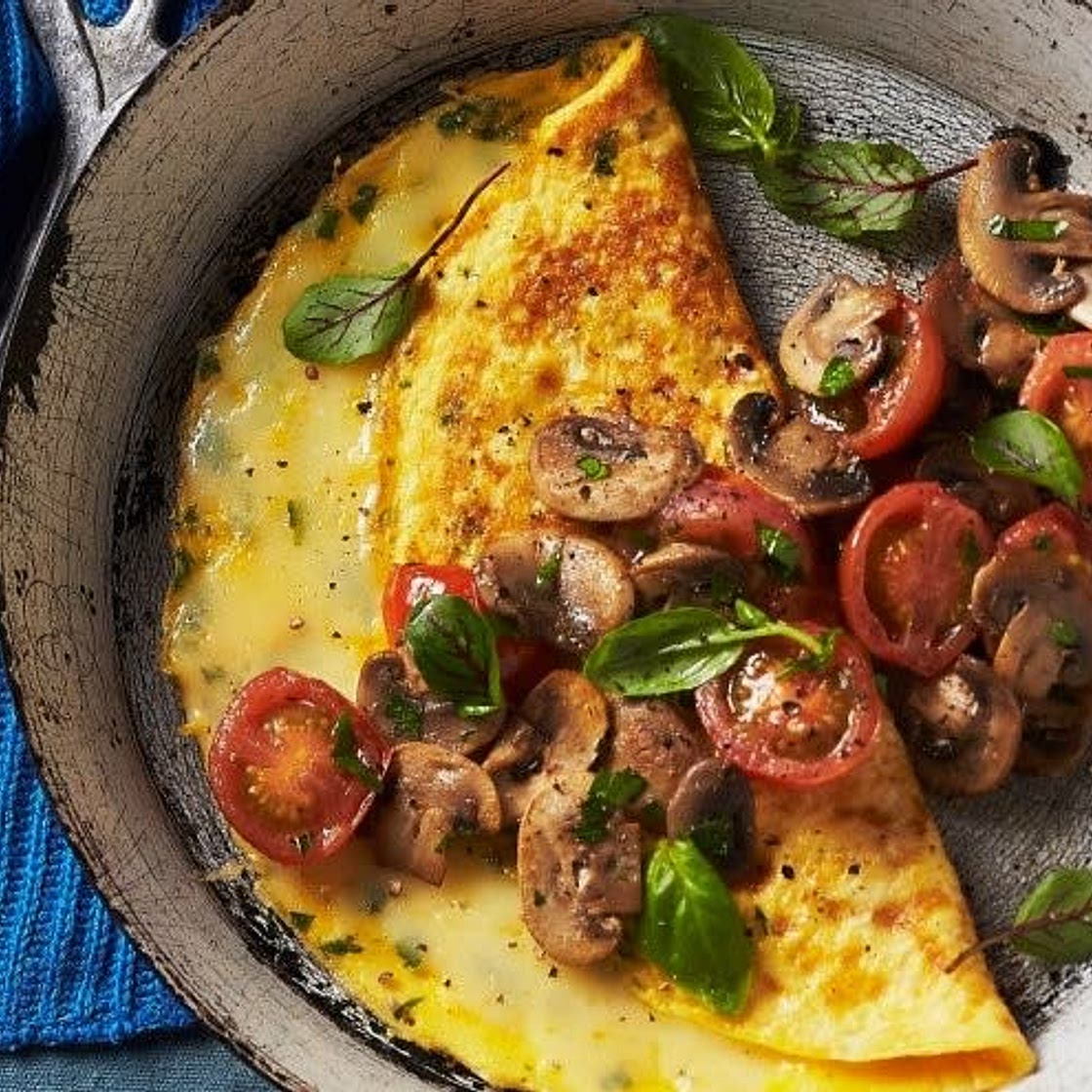 Mushroom and vasil onelette with smashed tomato