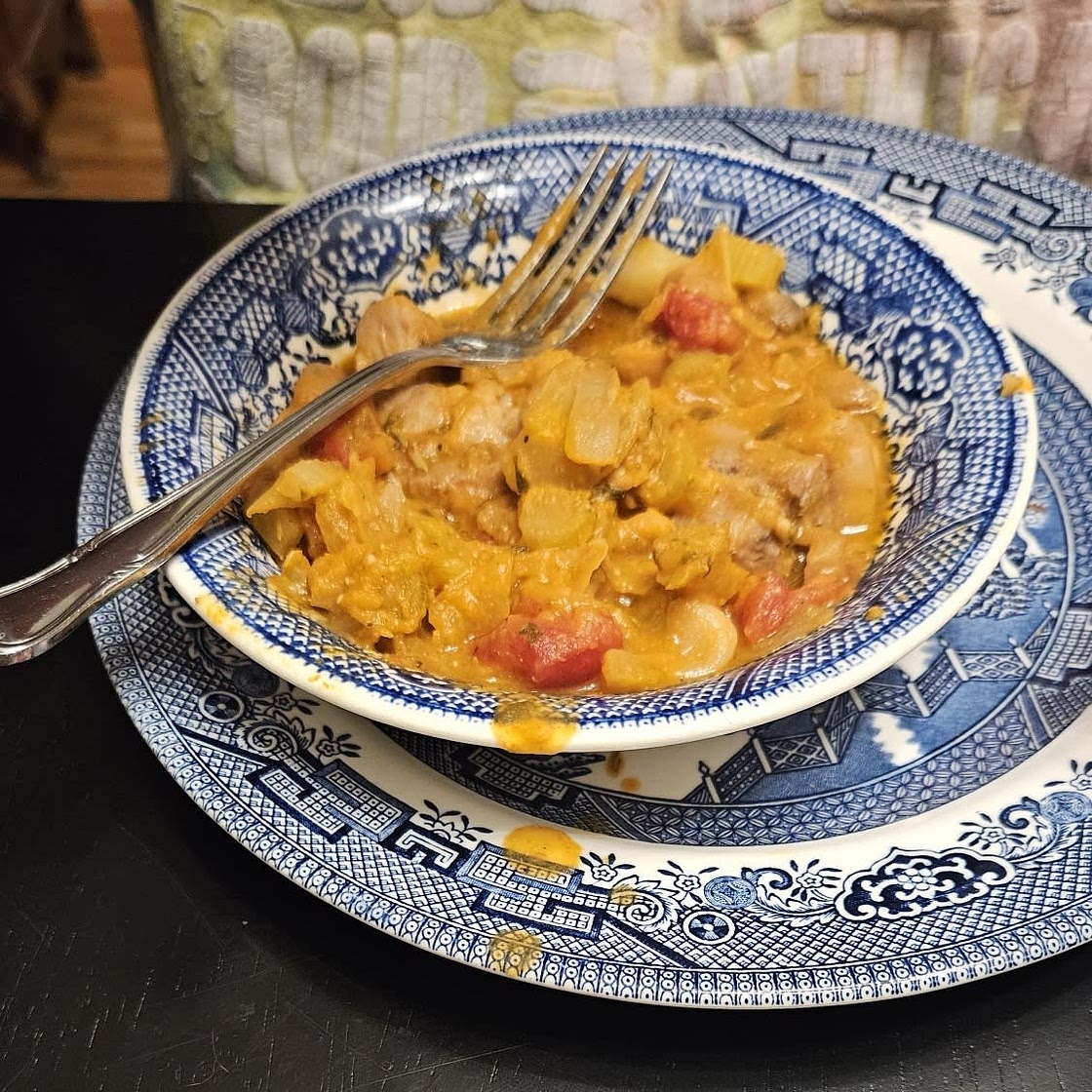 Pork steaks with tomato butter beans