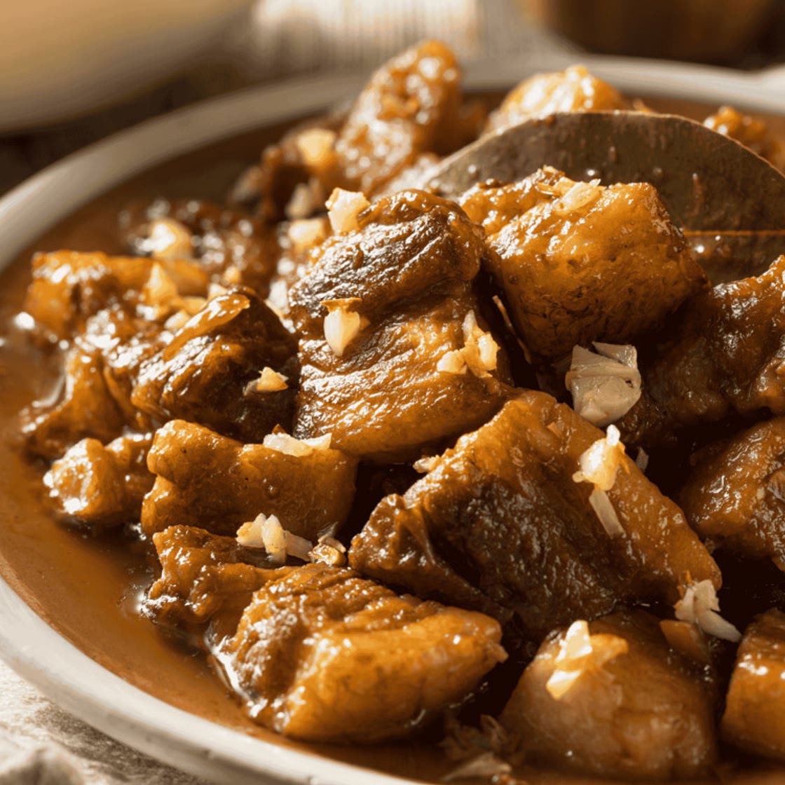 Filipino Adobo (Marinated Meat Stew) | DelishGlobe