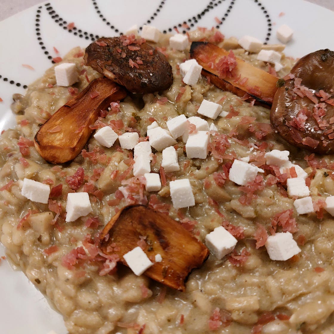 Risotto - Artichokes cream, prosciutto crudo, king oister mushrooms, and ricotta
